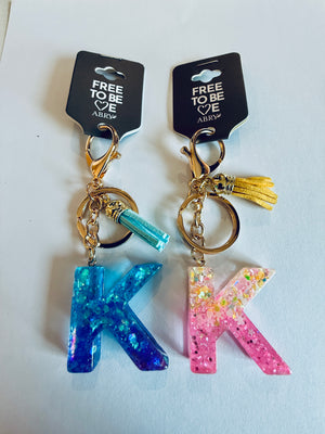 ALPHABET KEYCHAIN WITH LEATHER TASSEL