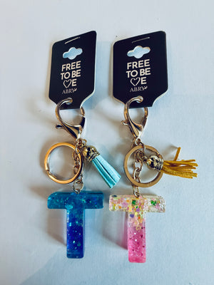 ALPHABET KEYCHAIN WITH LEATHER TASSEL